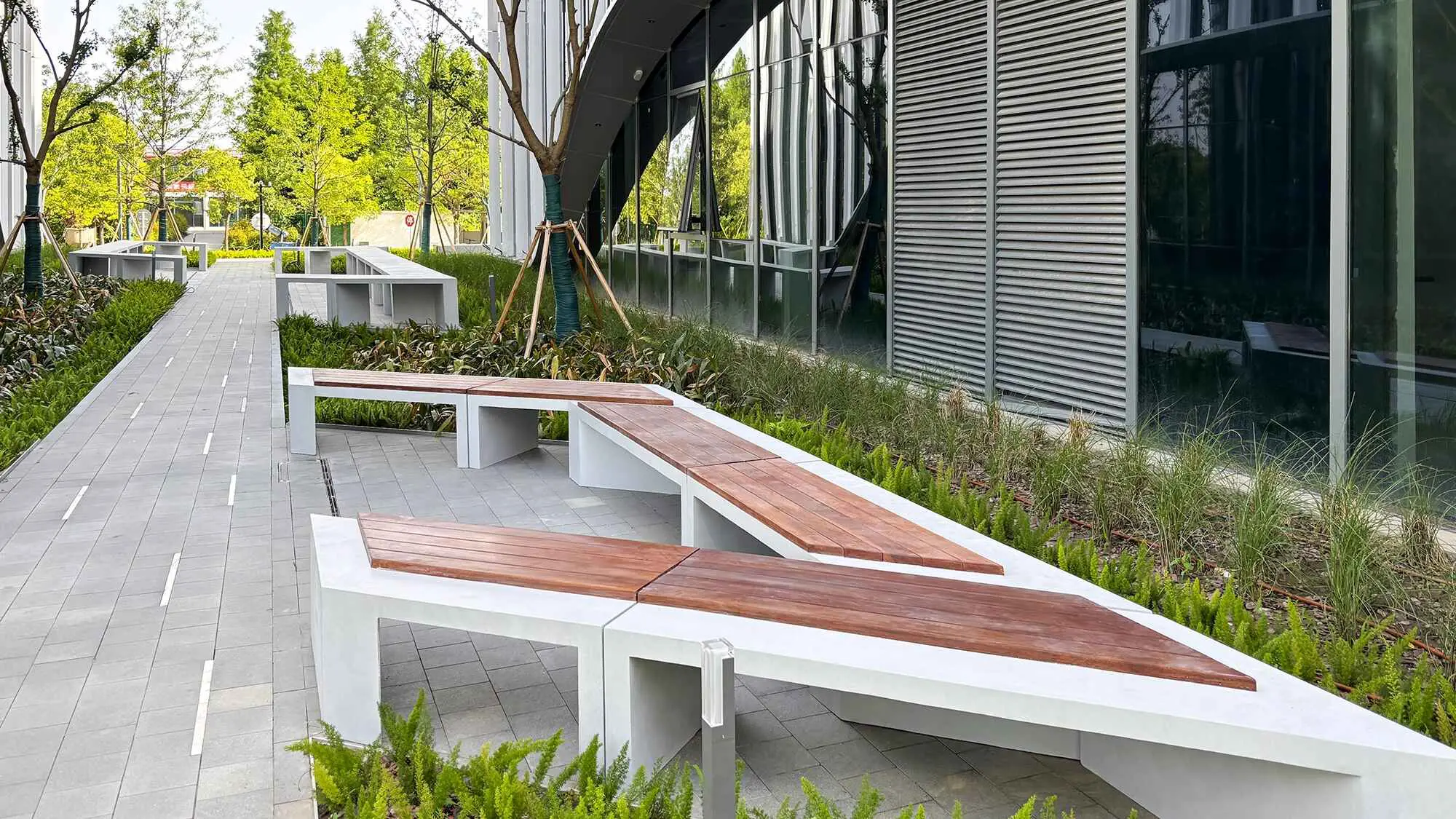 Concrete benches and bars between office buildings